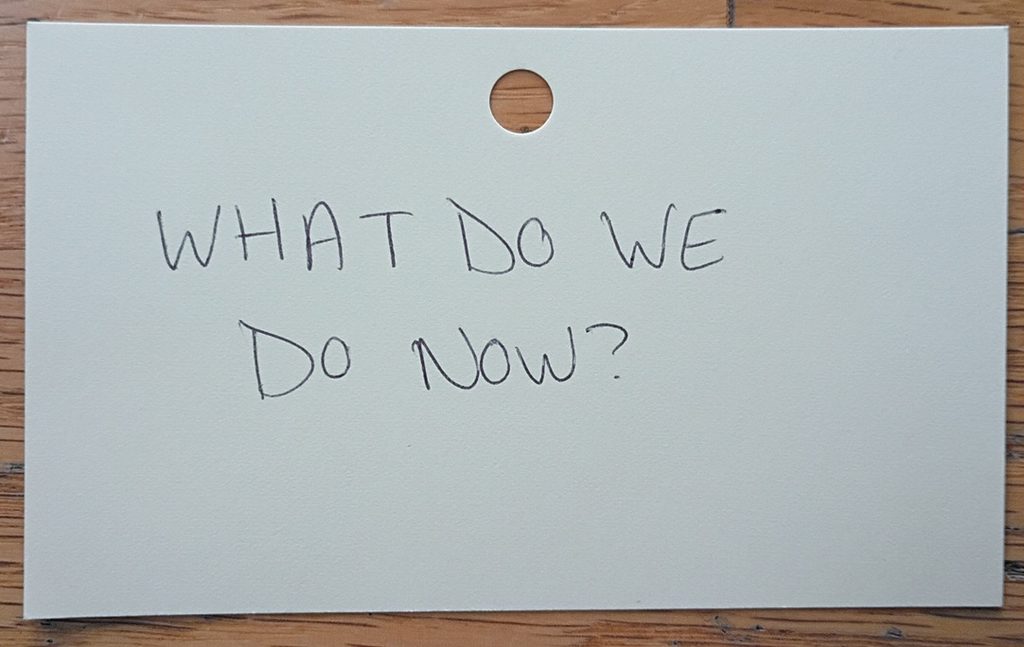 A note reading: What do we do now?