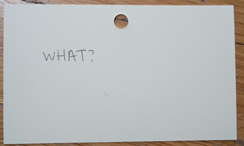 A note reading: What?
